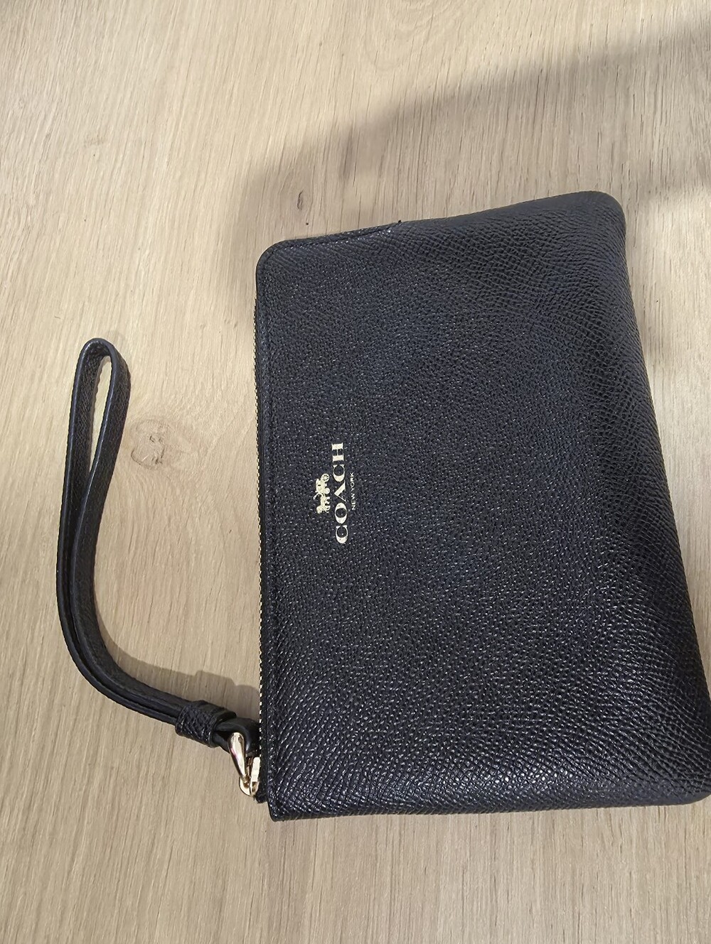 Coach Black Pebbled Leather Wristlet with Gold Logo